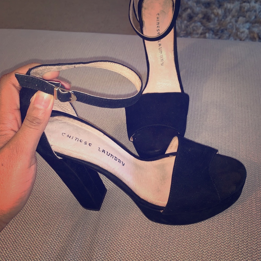 Black suede pumps